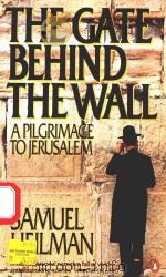 THE GATE BEHIND THE WALL A PILGRIMAGE TO JERUSALEM   1984  PDF电子版封面  0140084673   